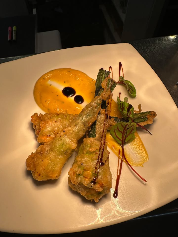 Featured image for ““When zucchini flowers dress up in crispy tempura and go out to party on a bed of pumpkin purée with balsamic bling — edible elegance with a crunch!””